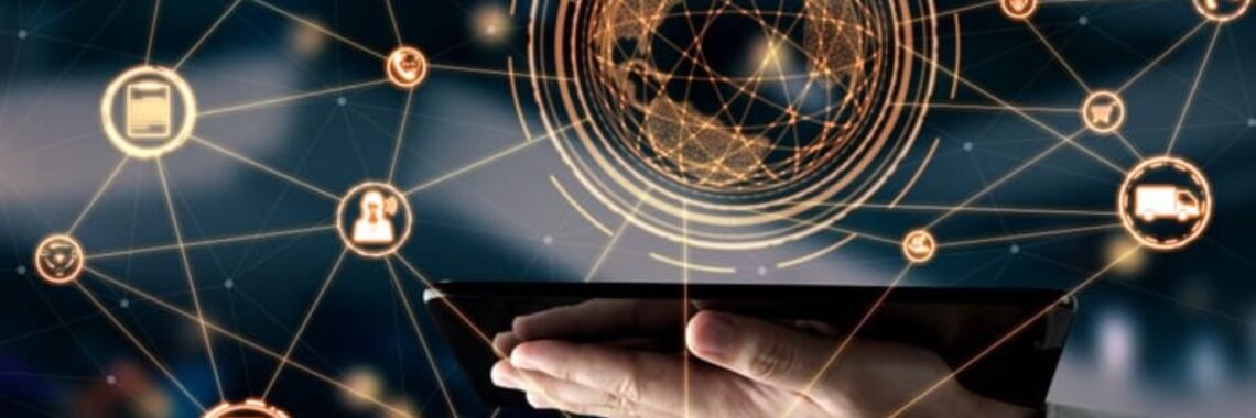 alt="a palm holding a tab with a holographic display of a digital globe of the world and interconnectivity of places."